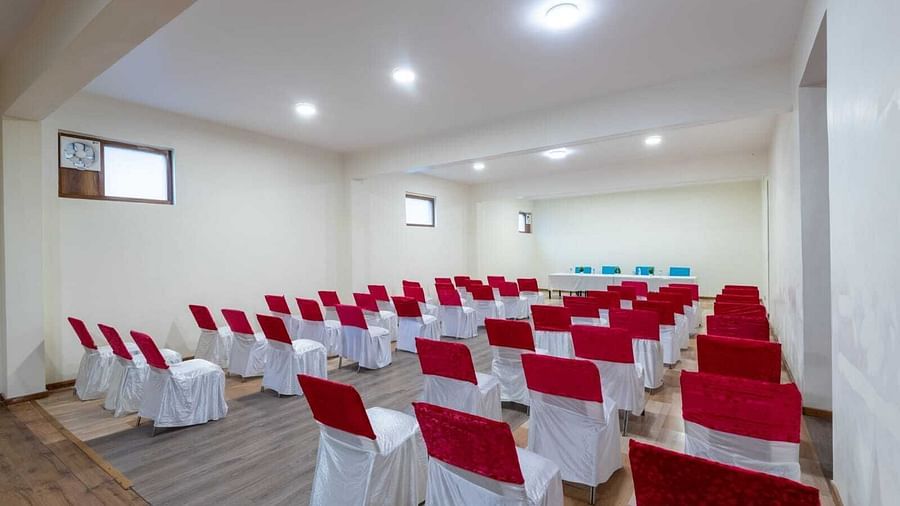 A large conference room with rows of chairs set up for a meeting or presentation  | DLS Serenity Resort and Spa